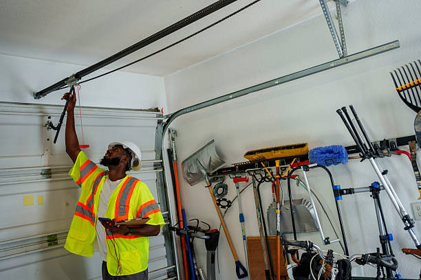 Professional Garage Door Maintenance technician working in Knoxville, IL
